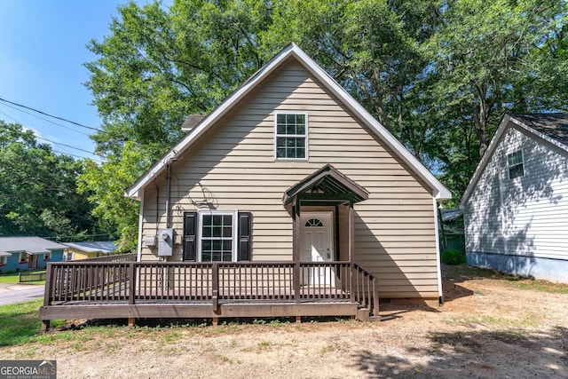 bungalow-style house with a deck