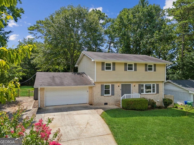 view of front facade featuring a garage and a front yard