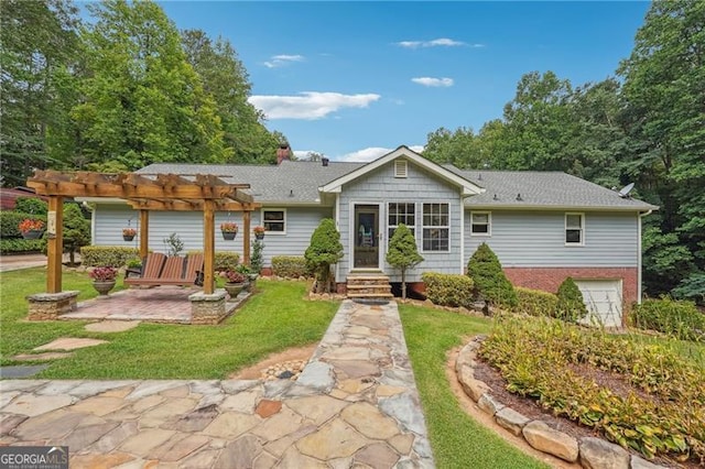 ranch-style home featuring a front lawn, a pergola, a patio area, and a garage