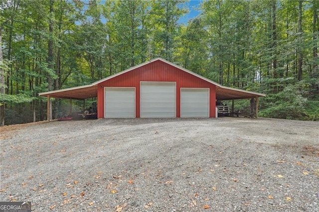 garage with a carport