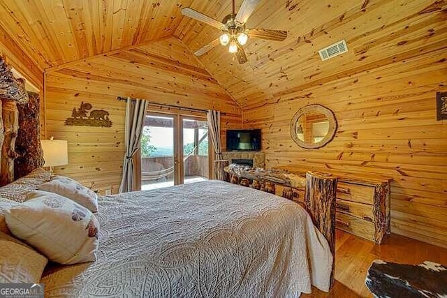 bedroom with ceiling fan, wooden ceiling, hardwood / wood-style flooring, and lofted ceiling