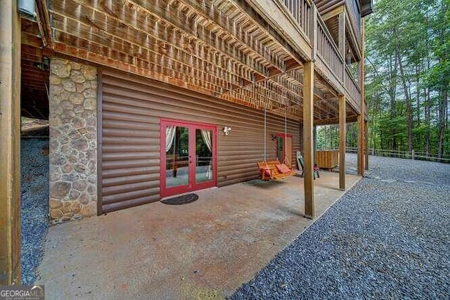 view of horse barn featuring french doors