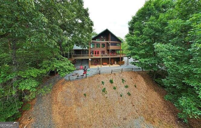 rear view of house with a deck