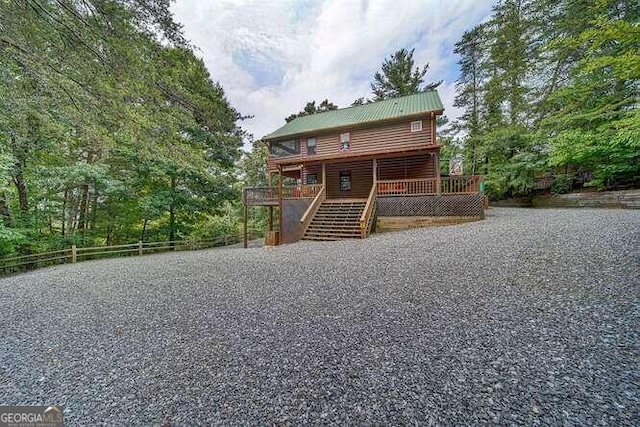 view of front of house with a wooden deck