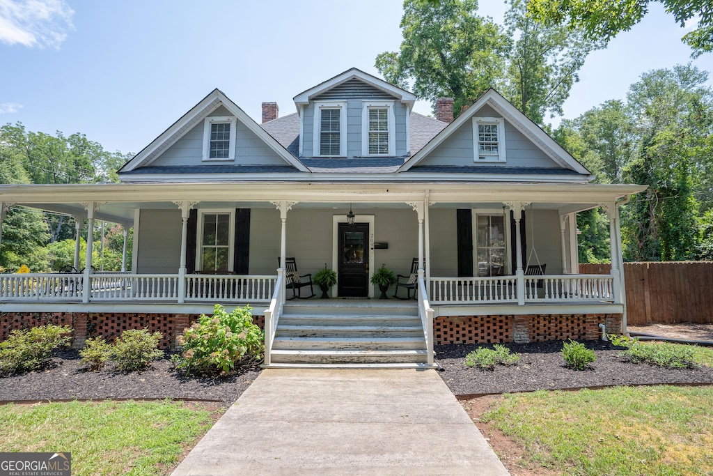 country-style home with covered porch