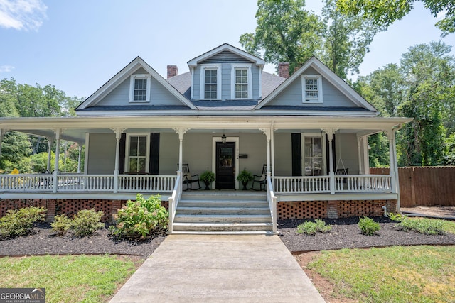 country-style home with covered porch