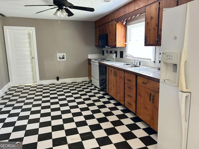 kitchen featuring a textured ceiling, black appliances, backsplash, sink, and ceiling fan