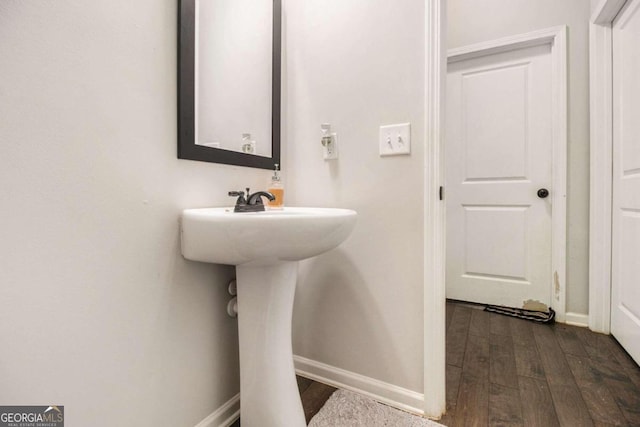 bathroom featuring wood-type flooring