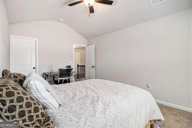 bedroom featuring vaulted ceiling, carpet flooring, and ceiling fan