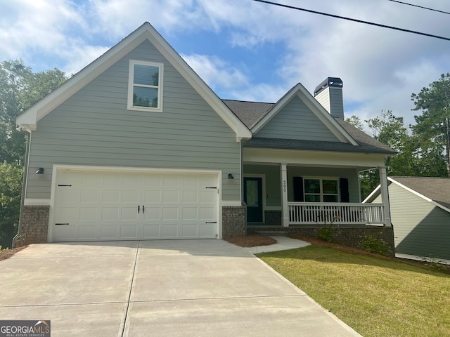 view of front of house featuring covered porch and a front lawn