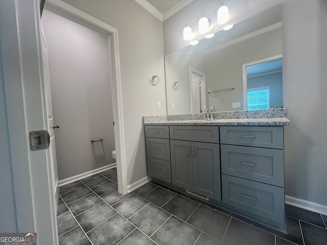 bathroom with tile patterned floors, toilet, and vanity