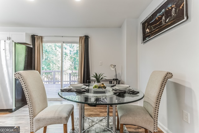 dining room featuring light wood-type flooring