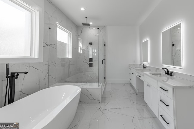 2861 Tree Top Rd, Dacula, GA 30019 - bathroom with a marble finish shower, vanity, recessed lighting, a freestanding bath, and marble finish floors