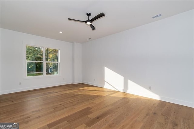 2861 Tree Top Rd, Dacula, GA 30019 - spare room with baseboards, wood finished floors, and recessed lighting