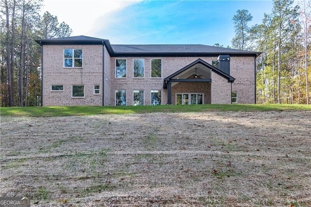 2861 Tree Top Rd, Dacula, GA 30019 - rear view of house with brick siding