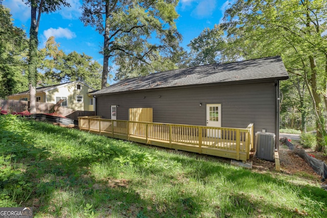 back of property featuring a wooden deck and central air condition unit