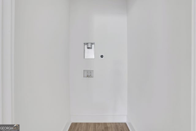 laundry area featuring hookup for an electric dryer, hardwood / wood-style floors, and hookup for a washing machine