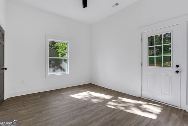 interior space with dark wood-type flooring