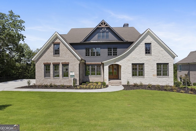 view of front of house with a front lawn