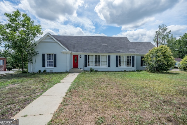 single story home with a front yard