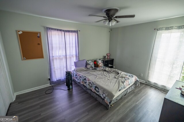 bedroom featuring ceiling fan and hardwood / wood-style floors