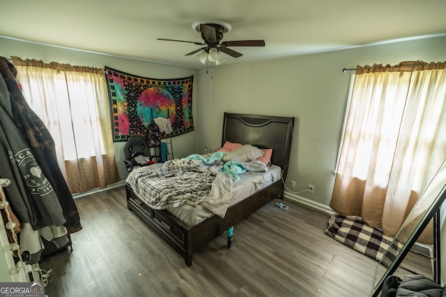 bedroom featuring hardwood / wood-style floors and ceiling fan