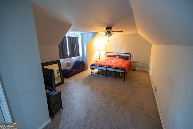 bedroom featuring lofted ceiling, carpet floors, and ceiling fan