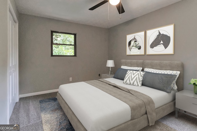 bedroom featuring ceiling fan, a closet, and carpet floors