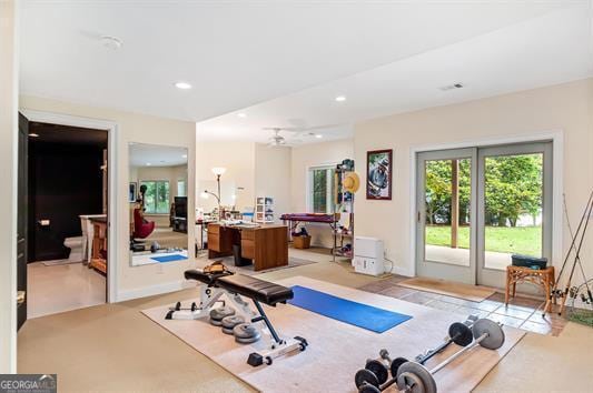 workout room with plenty of natural light, baseboards, visible vents, and recessed lighting