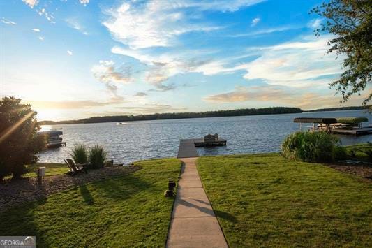 view of water feature with a dock