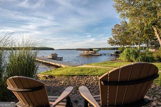 property view of water featuring a boat dock