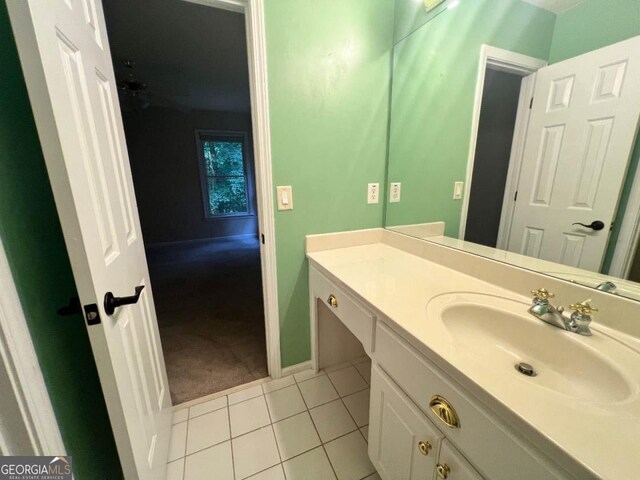 bathroom featuring vanity and tile patterned flooring