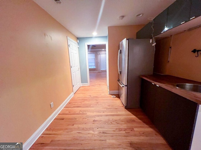 hallway featuring light hardwood / wood-style flooring