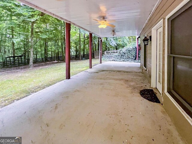 view of patio featuring ceiling fan