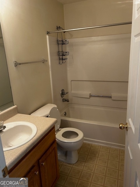 full bathroom featuring vanity, shower / bath combination, tile patterned flooring, and toilet