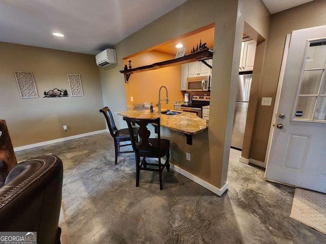 870 Morton Dr, Ellijay, GA 30540 - bar area with stainless steel appliances, concrete flooring, a wall mounted air conditioner, and recessed lighting