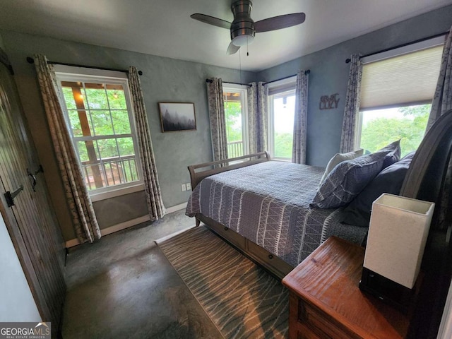 870 Morton Dr, Ellijay, GA 30540 - carpeted bedroom featuring baseboards and a ceiling fan