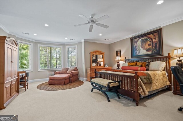 bedroom with ceiling fan, light carpet, and ornamental molding