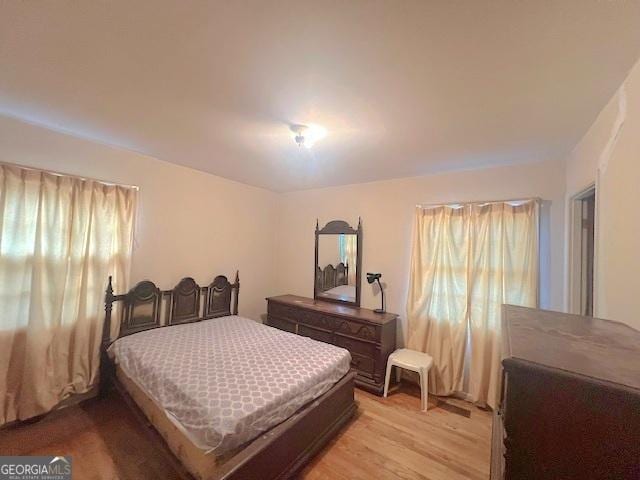 bedroom featuring light hardwood / wood-style floors