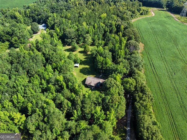 bird's eye view with a forest view and a rural view