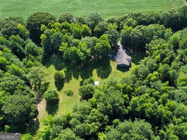 aerial view with a view of trees and a rural view