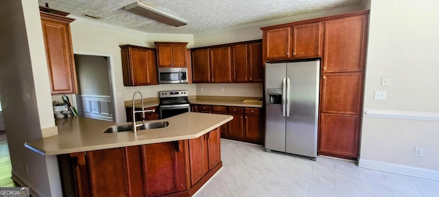 kitchen featuring a textured ceiling, crown molding, sink, and stainless steel appliances