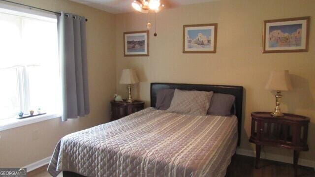 2296 Athens Rd, Royston, GA 30662 - bedroom with wood finished floors and baseboards