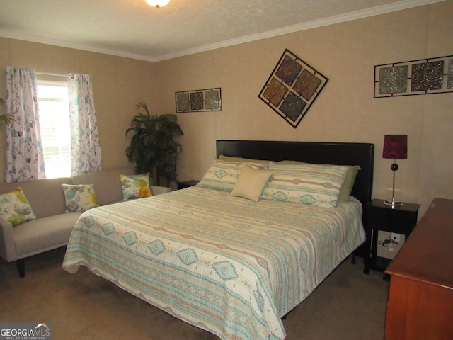 bedroom with crown molding and dark colored carpet