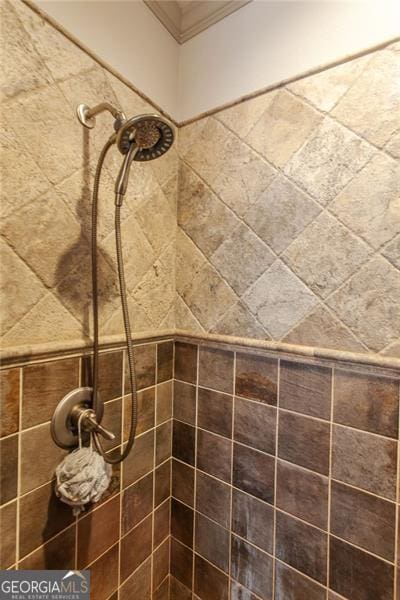 interior space with tiled shower