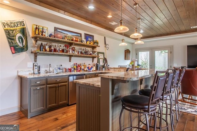 bar with dishwasher, wood-type flooring, and wood ceiling