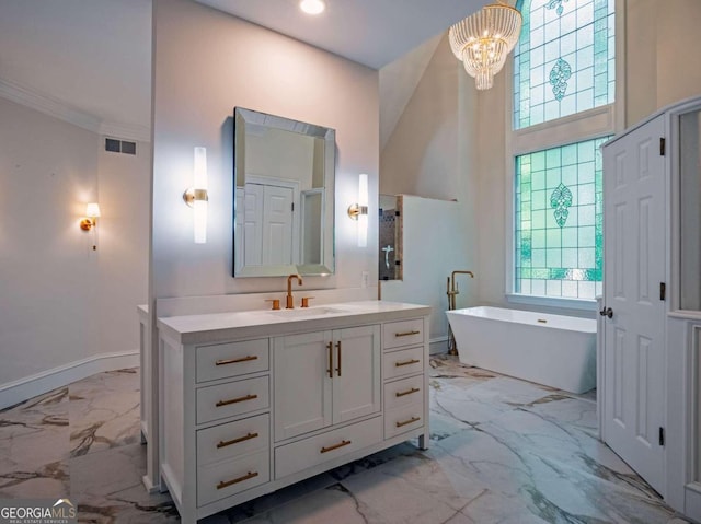 bathroom with tile patterned flooring, a tub, vanity, a chandelier, and a towering ceiling