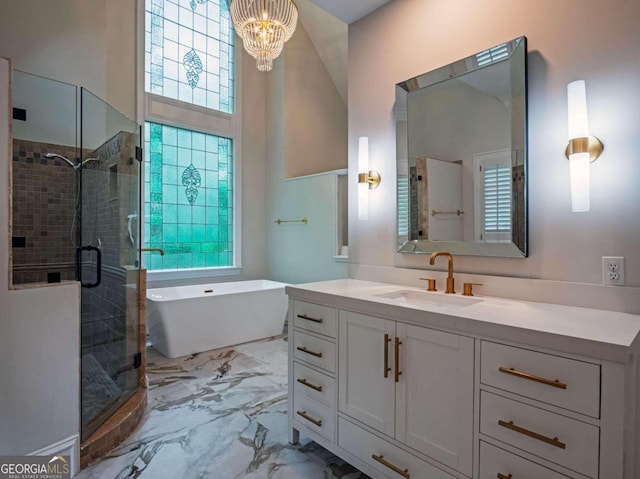 bathroom with tile patterned flooring, separate shower and tub, vanity, and plenty of natural light