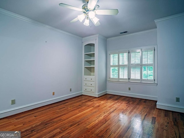 unfurnished room featuring ceiling fan, hardwood / wood-style flooring, and ornamental molding