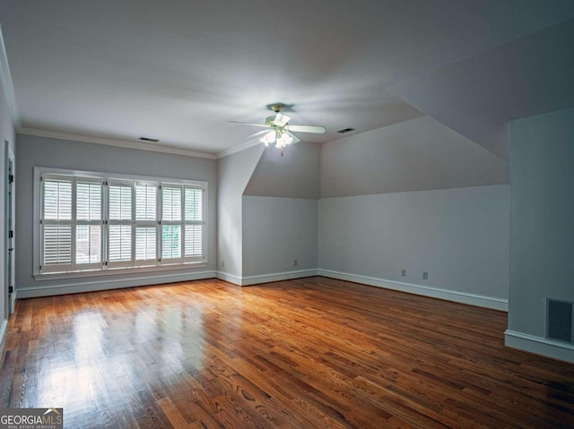 bonus room featuring hardwood / wood-style flooring, lofted ceiling, and ceiling fan